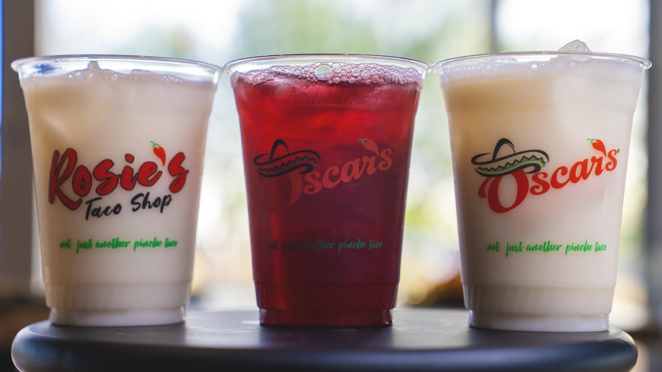 Fountain drinks and aguas frescas in branded cups